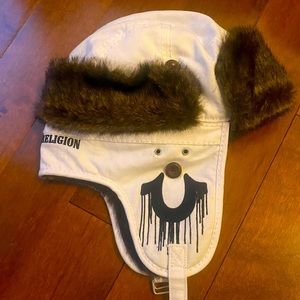 True Religion trapper hat! New without tags. White and black with fur. L/XL
